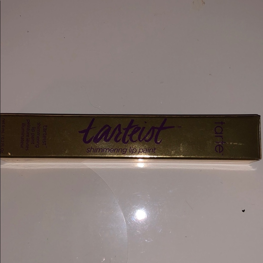 Tarte shimmering lip paint color “flaming hot”